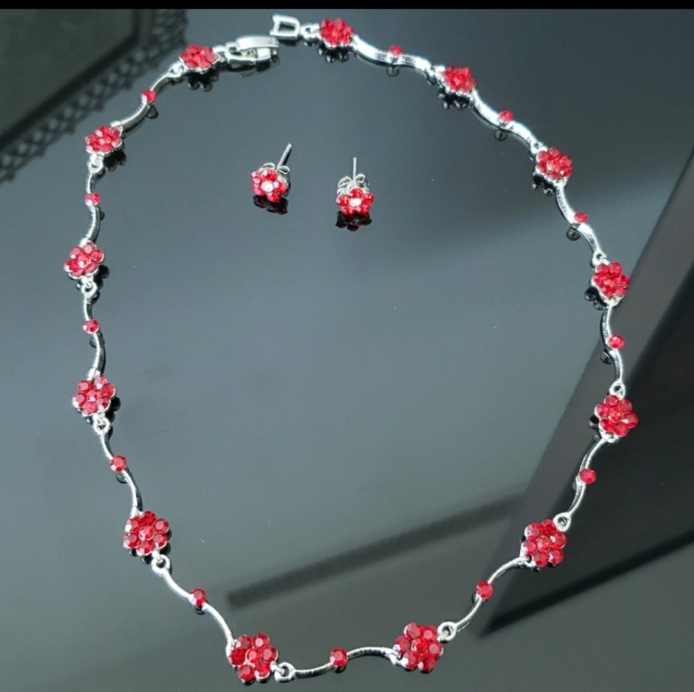 Made in Korea with Swarovski crystals and is rhodium plated